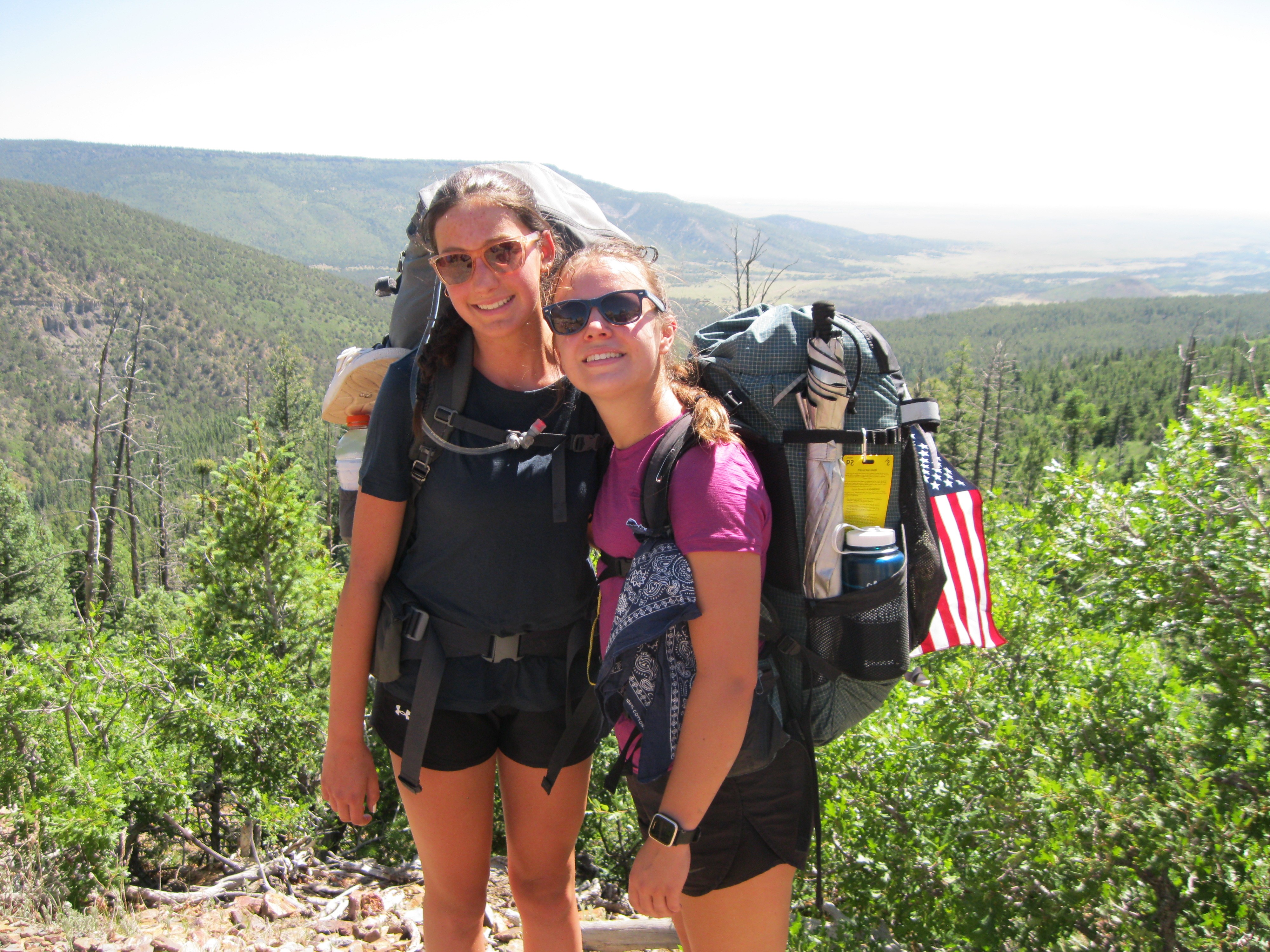 Cora backpacking with a friend