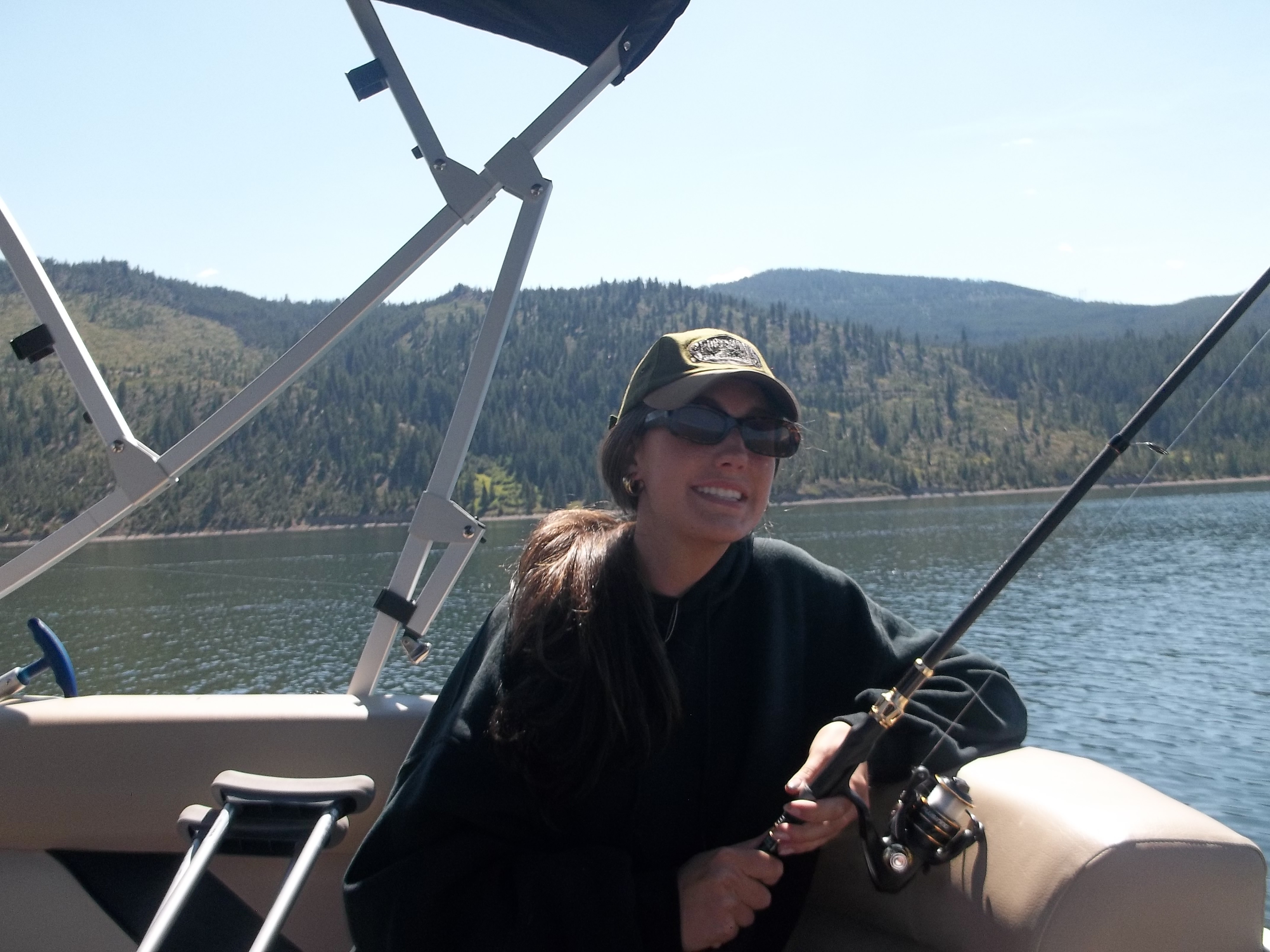 Cora fishing by a lake