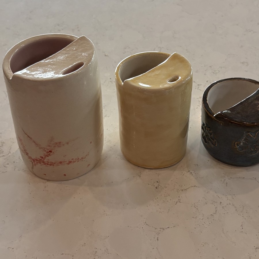 Three ceramic mugs