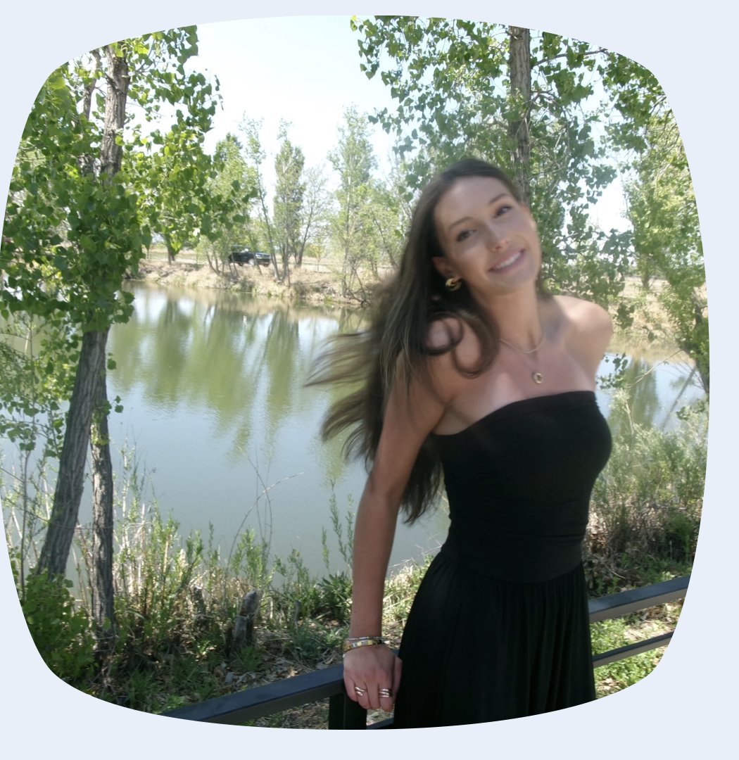 Cora Jungman outdoors by a river