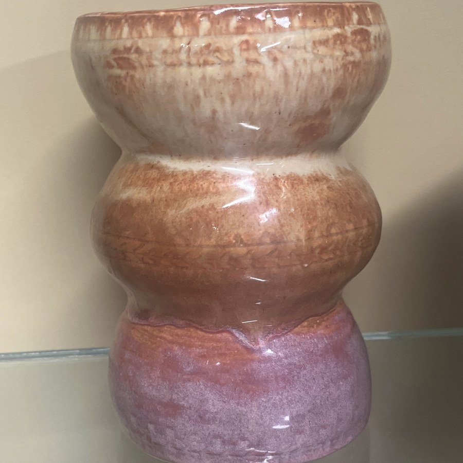 Hourglass shaped ceramic vase