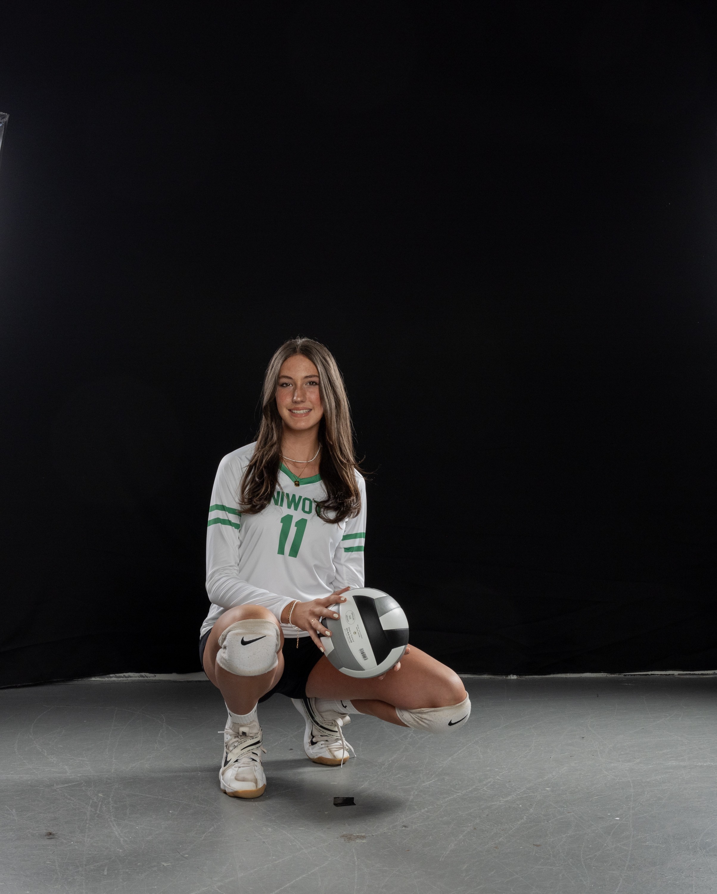 Cora in volleyball uniform portrait